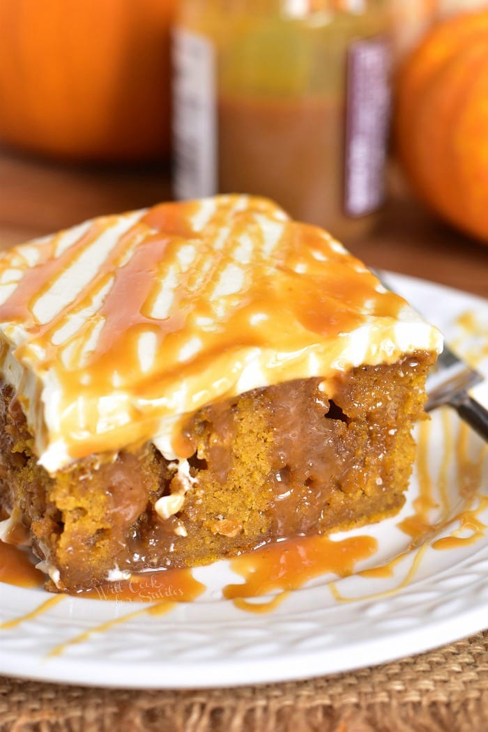 Pumpkin Cake with Salted Caramel and Cream Cheese Frosting. Soft, moist pumpkin cake soaked with salted caramel and topped with smooth cream cheese frosting. This pumpkin cake is paired beautifully with salted caramel flavors and creamy frosting in each bite. #cake #Pumpkin #pumpkincake #caramelcake #saltedcaramel