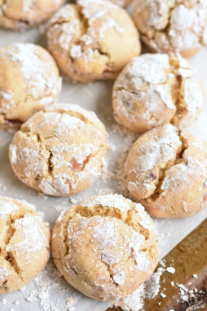 soft and chewy crinkled maple pecan cream cheese cookies on the baking sheet.