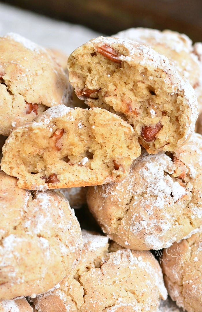 Soft Maple Pecan Cream Cheese Cookies stacked on top of each other 