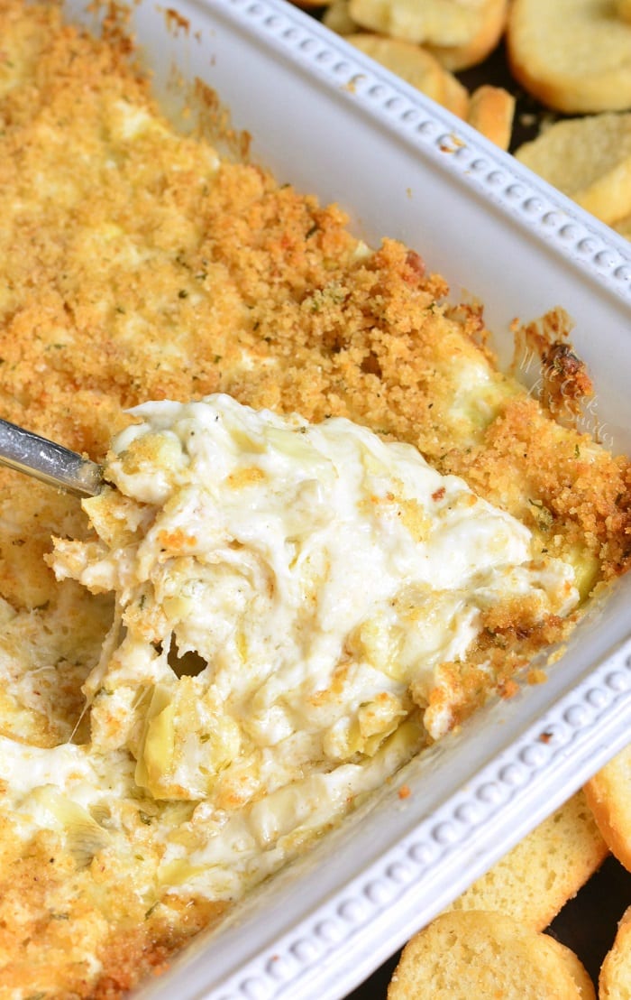 Artichoke Dip with Crab in a baking dish 