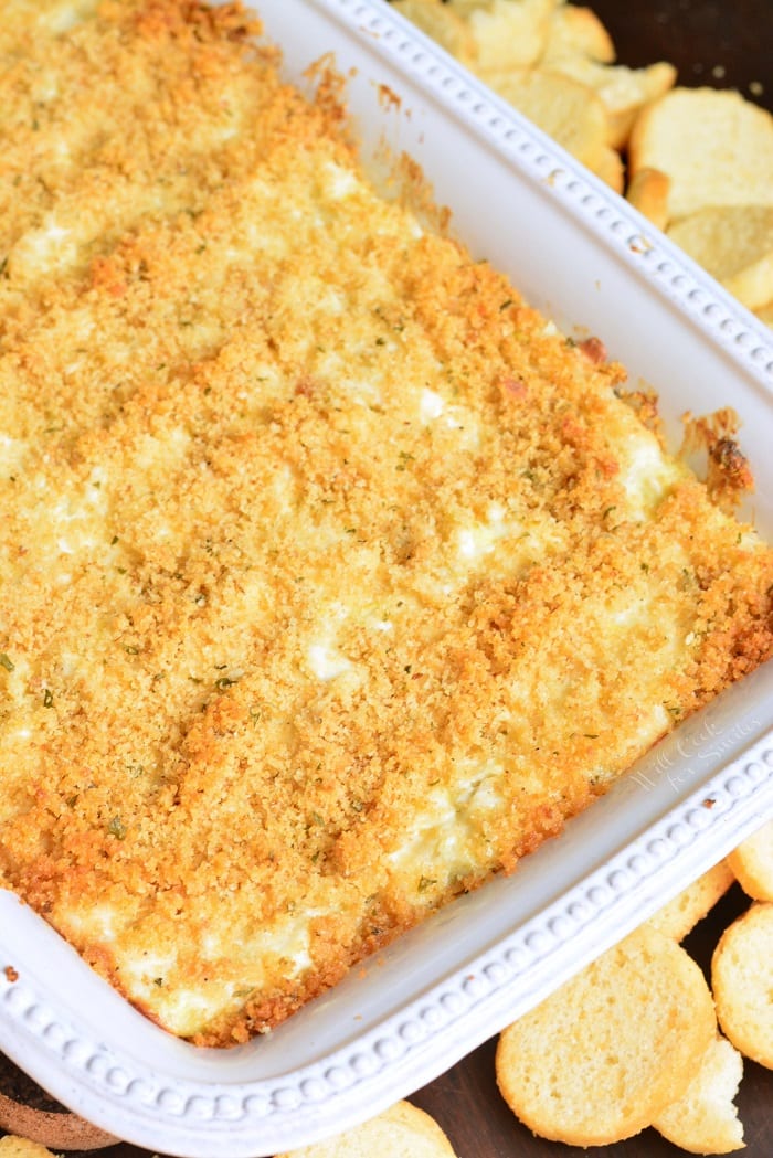 Creamy Crab and Artichoke Dip in a baking dish 