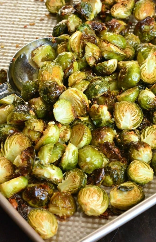 gathered roasted brussels sprouts on baking sheet.