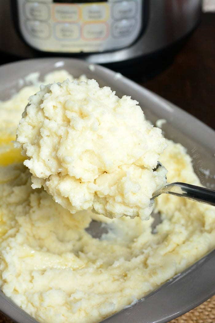 Instant Pot Garlic Mashed Potatoes in a serving spoon 