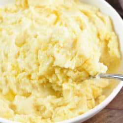 closeup of scooping out mashed potatoes.