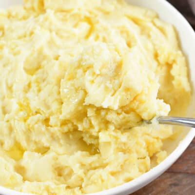 closeup of scooping out mashed potatoes.