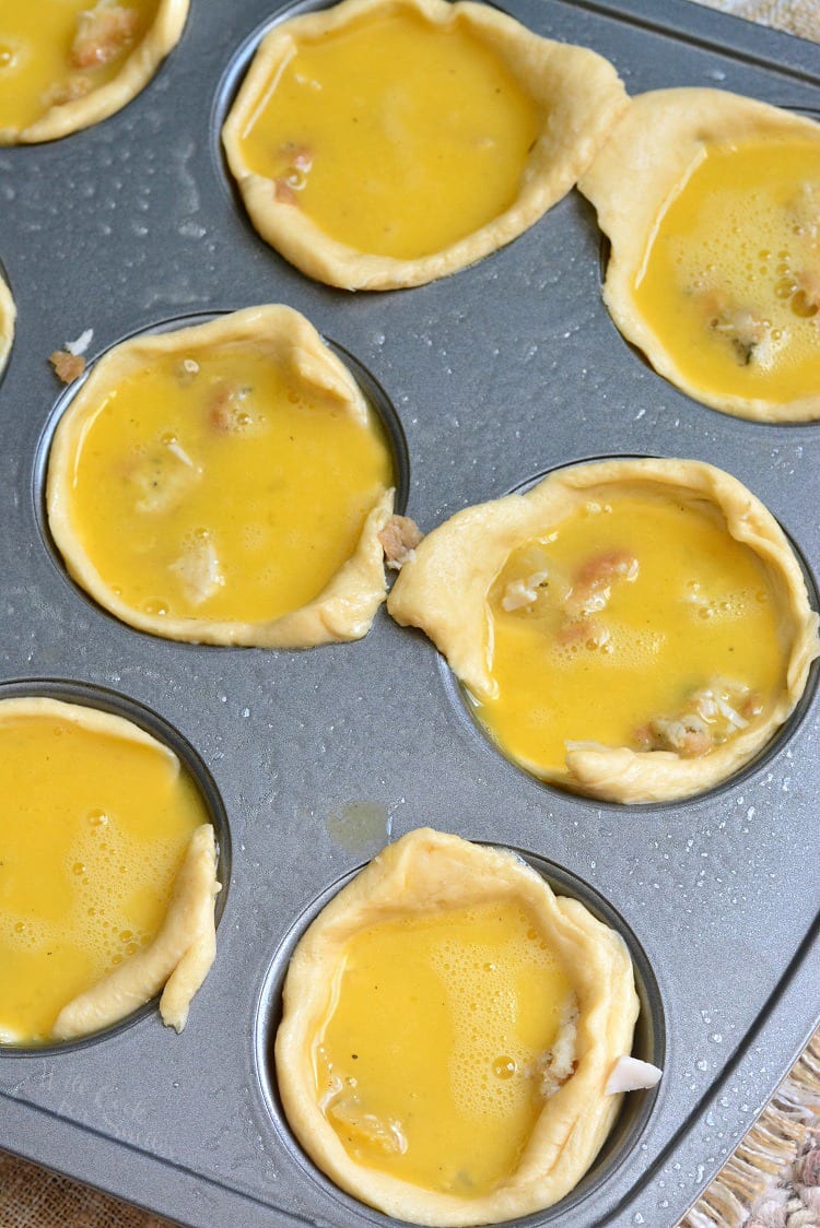 Leftover Turkey Breakfast Egg Muffins filling unbaked in a muffin tin 