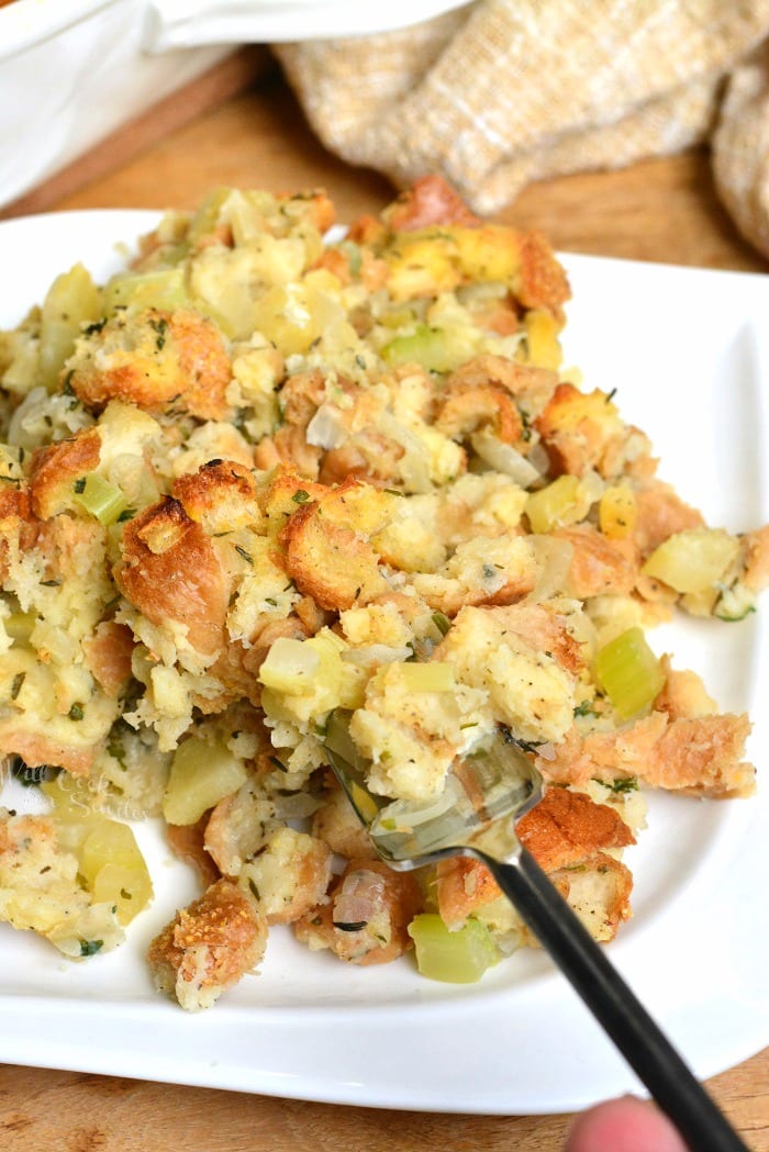Classic Stuffing Recipe. This stuffing is made with Italian bread, apples, celery, onions, and herbs. #sidedish #stuffing #bread #thanskgiving #dinner #sides