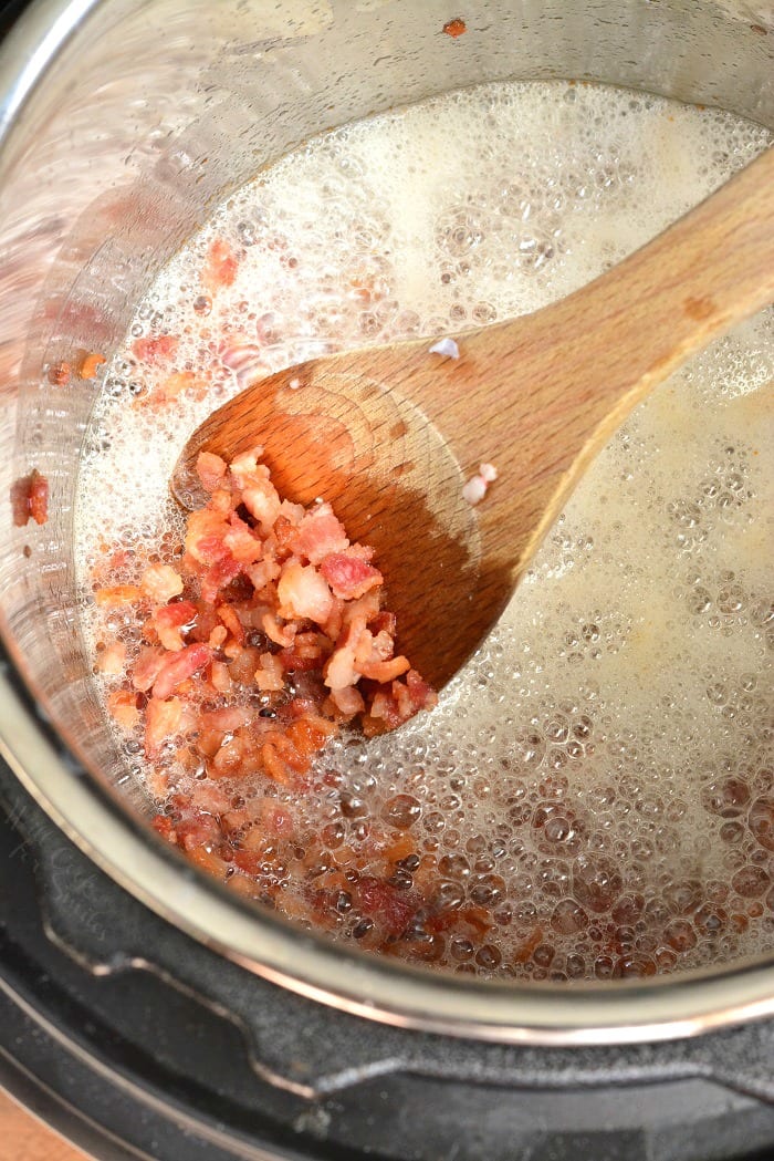 cooking baking instant pot with wooden spoon 