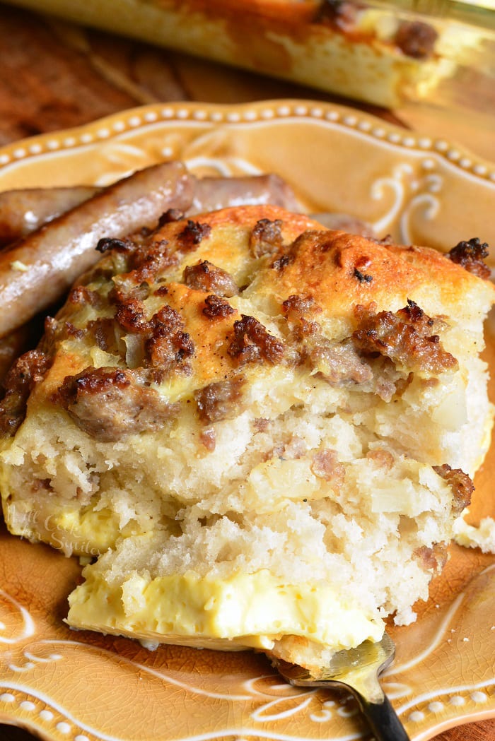 Breakfast Casserole. Perfect for breakfast and brunch, this casserole is made with fluffy biscuits, egg and milk mixture, sausage, and onions. #breakfast #brunch #casserole #sausage #eggs #biscuits