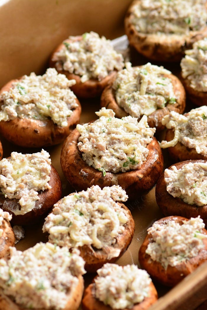 Sausage Stuffed Mushrooms uncooked in a baking dish 