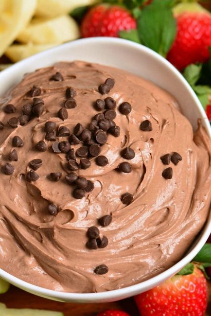 closeup of chocolate dip in a white bowl with chocolate chips