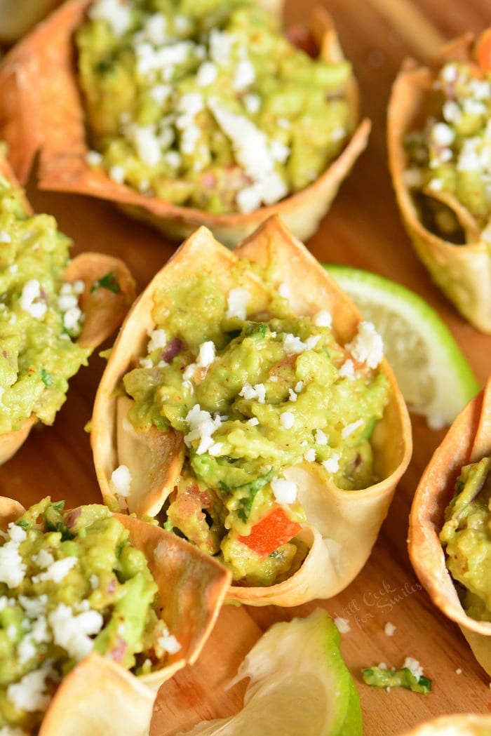 close up of Guacamole Cups on a cutting board.