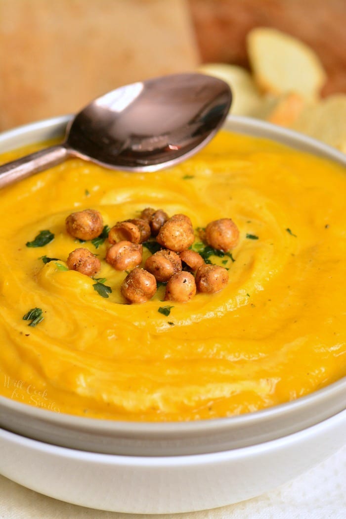 Butternut Squash Soup in a bowl with a spoon 
