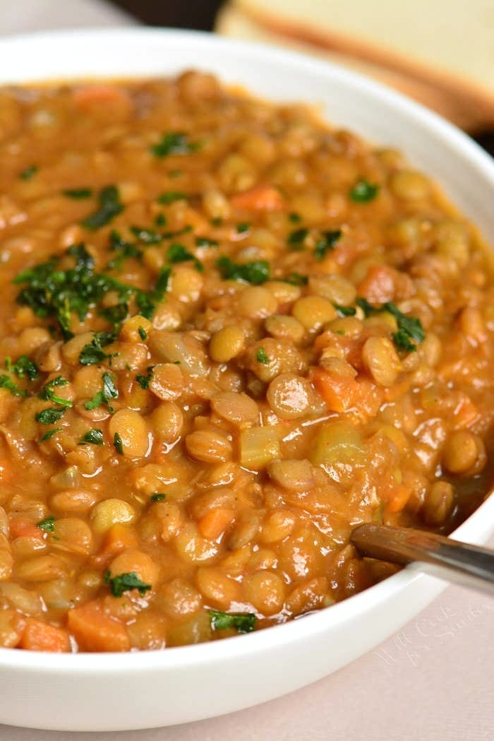 Lentil Soup in a bowl with a spoon 