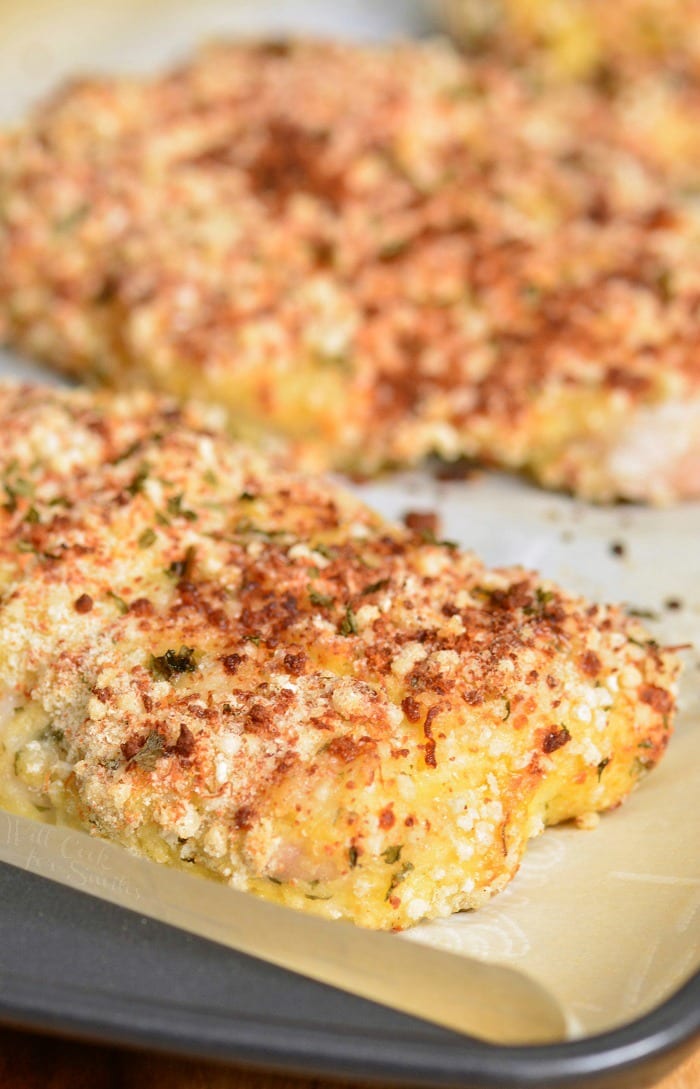 Baked Mahi Mahi on a baking sheet lined with parchment paper 