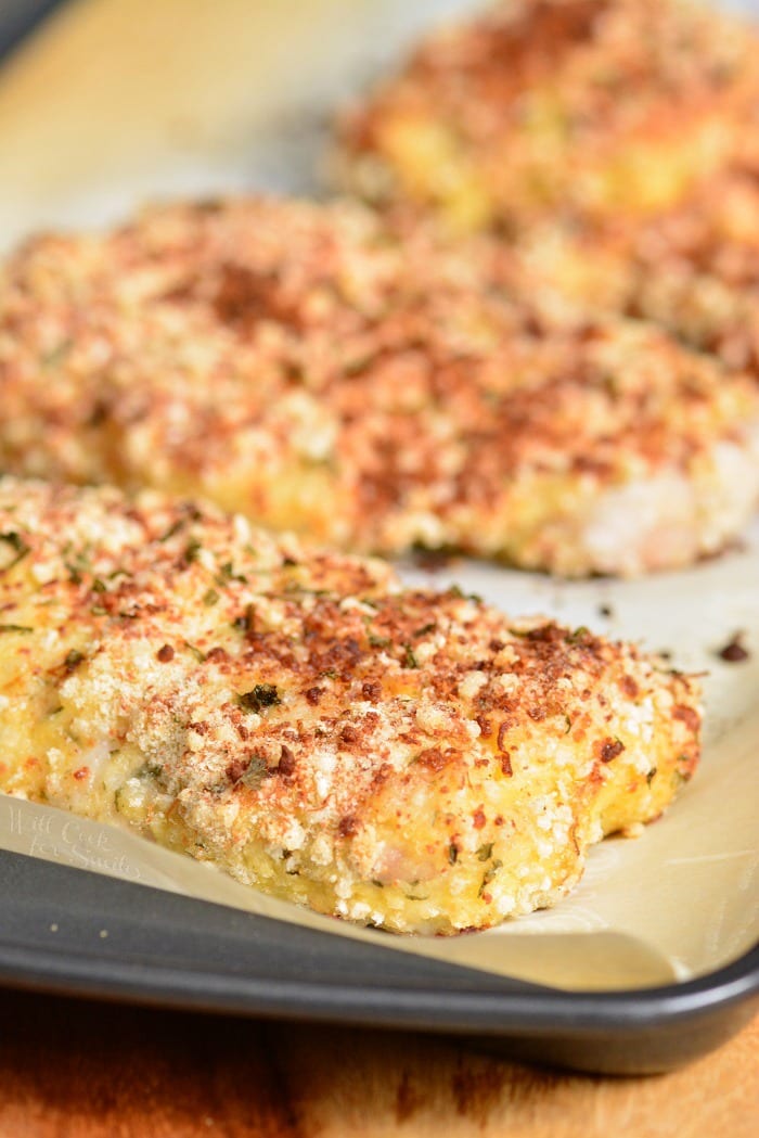 Parmesan Crusted Mahi Mahi on a baking sheet lined with parchment paper 