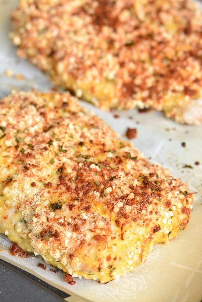 Baked Mahi Mahi on a baking dish with parchment paper 