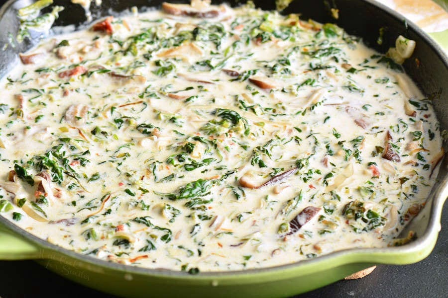 Shrimp Florentine is a fast and easy shrimp dinner recipe that features juicy shrimp cooked with spinach, mushrooms, shallots, sun-dried tomatoes, and white wine cream sauce. #shrimp #dinner #easydinner #30minute #seafood