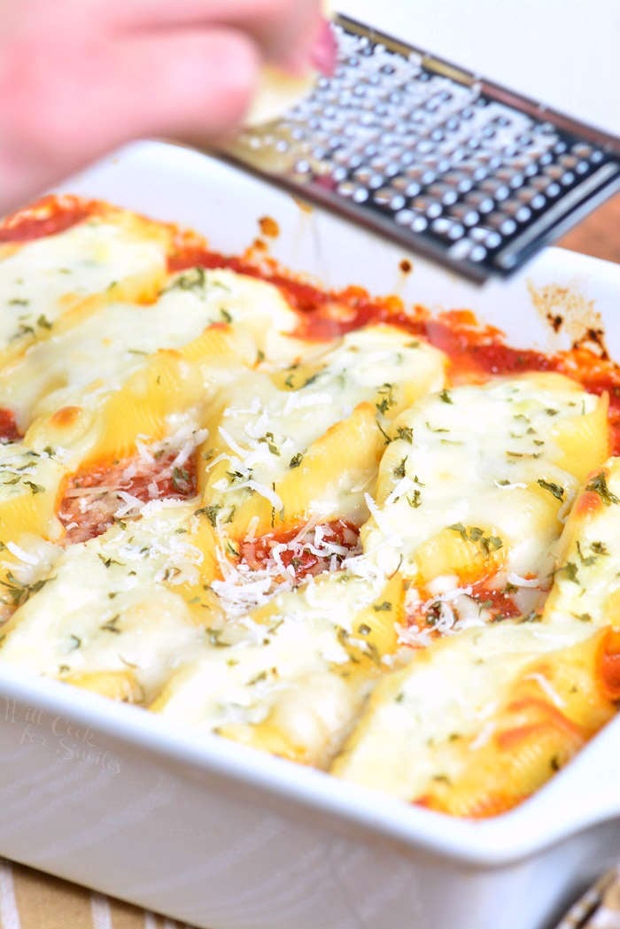 Ricotta Stuffed Shells made with flavorful three cheese ricotta filling and homemade marinara sauce. This stuffed shells recipe is extra cheesy and made with fresh herbs and garlic flavors. #pasta #stuffedshells #meatless #ricotta