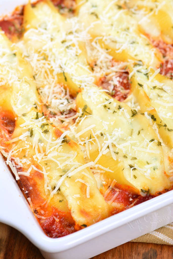 Ricotta Stuffed Shells made with flavorful three cheese ricotta filling and homemade marinara sauce. This stuffed shells recipe is extra cheesy and made with fresh herbs and garlic flavors. #pasta #stuffedshells #meatless #ricotta