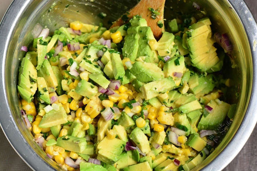 ingredients for Avocado Corn Salad in a metal bowl 