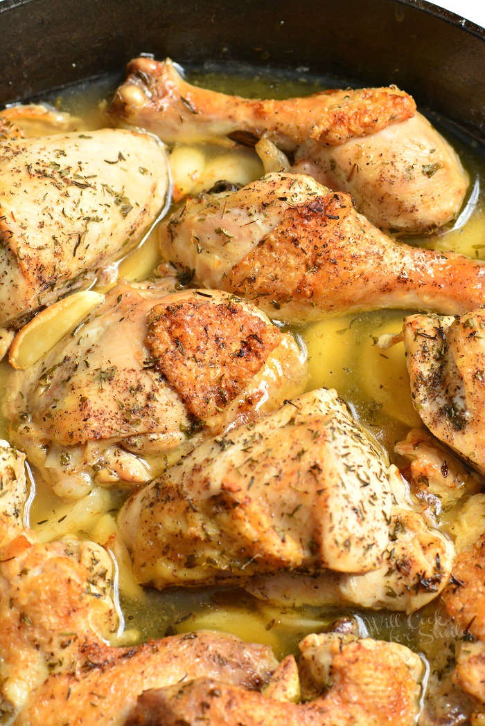 Garlic Chicken. Amazing baked chicken made with lots of garlic, white wine, chicken broth, and herbs. Learn how to easily break down the whole chicken for this garlic chicken recipe. #chicken #bakedchicken #garlicchicken #easydinner