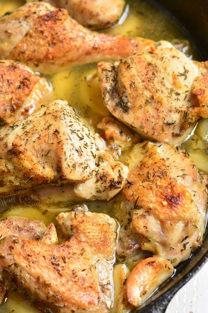 Garlic Chicken. Amazing baked chicken made with lots of garlic, white wine, chicken broth, and herbs. Learn how to easily break down the whole chicken for this garlic chicken recipe. #chicken #bakedchicken #garlicchicken #easydinner