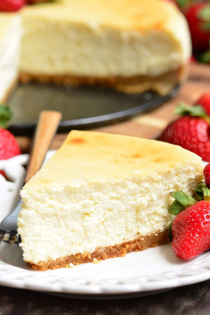 closeup of a slice of classic cheesecake on a plate