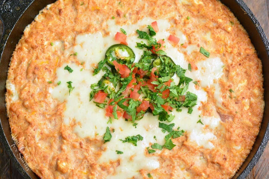 Cheesy Bean Dip in a cast iron skillet 
