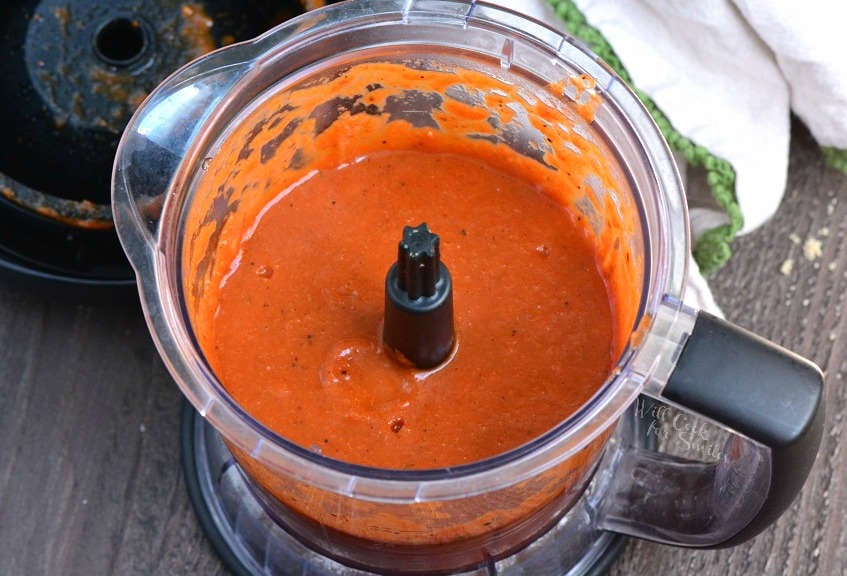 How to make Enchilada Sauce in a food processor with the lid off on a wood cutting board 