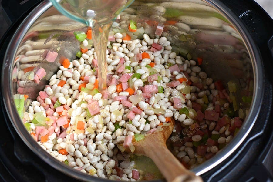 Easy Ham and Bean Soup made in an Instant Pot. This soup is made with leftover ham, navy beans, and a simple combination of veggies and spices.