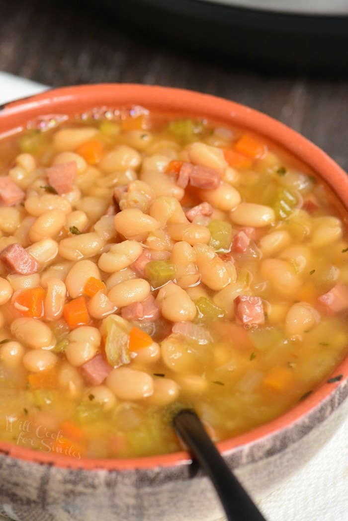 Easy Ham and Bean Soup made in an Instant Pot. This soup is made with leftover ham, navy beans, and a simple combination of veggies and spices.