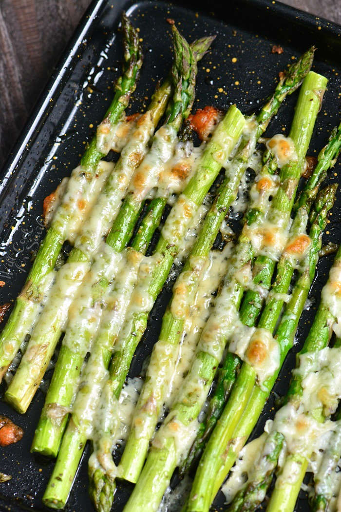 Italian Roasted Asparagus is a simple side dish that will be ready in less than 20 minutes. It's made with addition of Italian flavors like oregano, parsley, and Parmesan cheese.