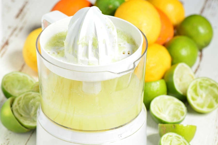lime juice in a small white citrus juices