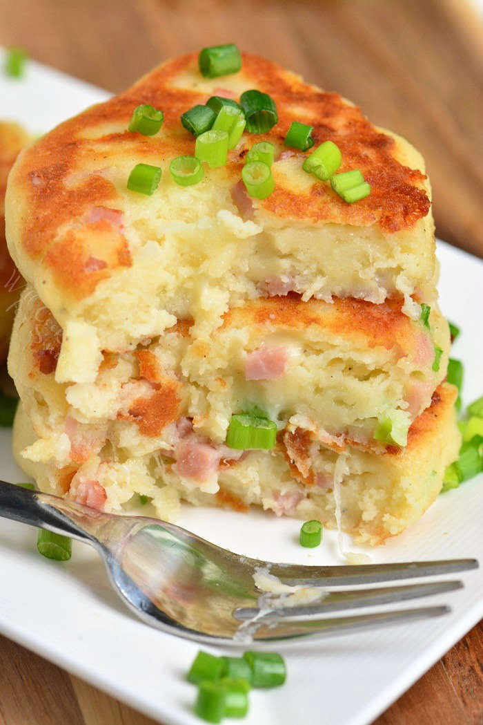 stack of three potato cakes cut through the middle. 