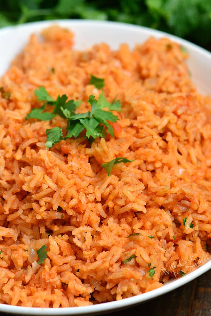 Spanish Rice aka Mexican Rice in a white serving bowl 