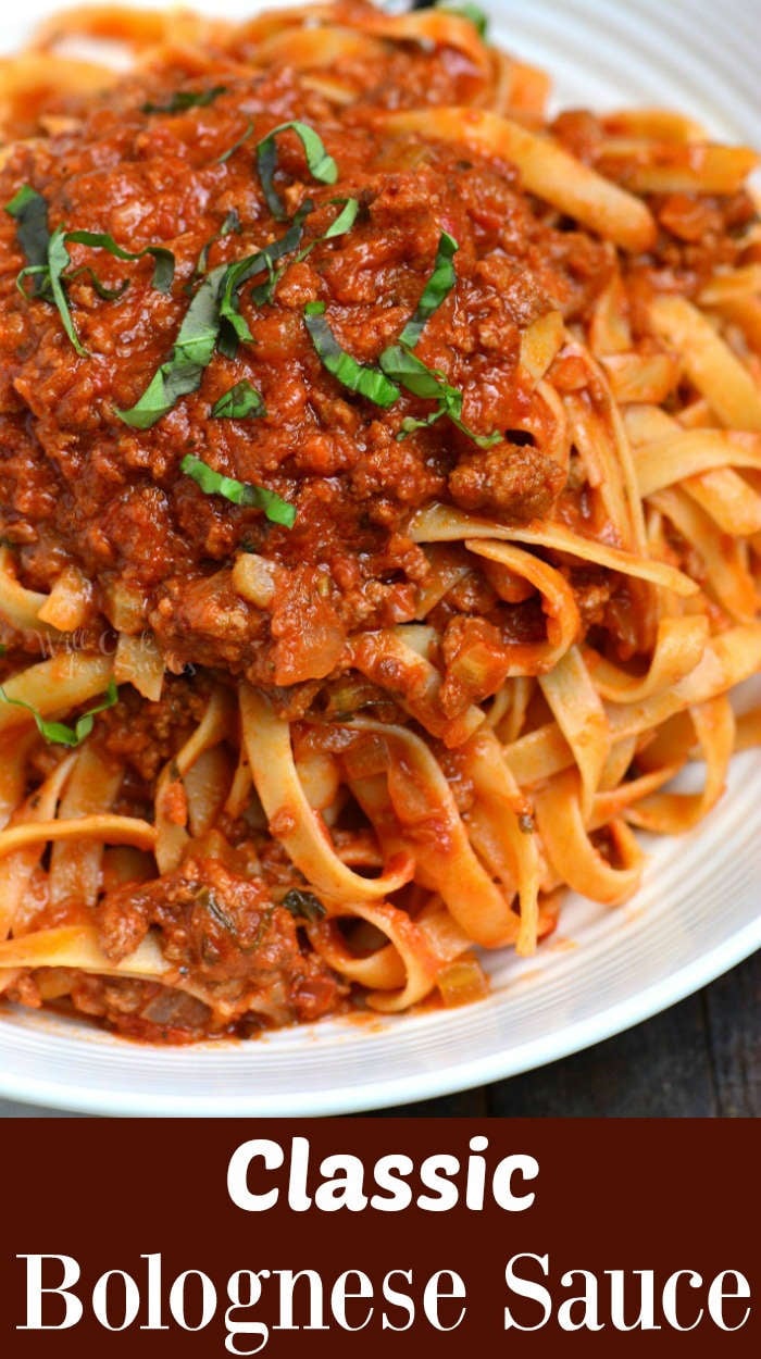 Bolognese Sauce over pasta in a serving bowl 