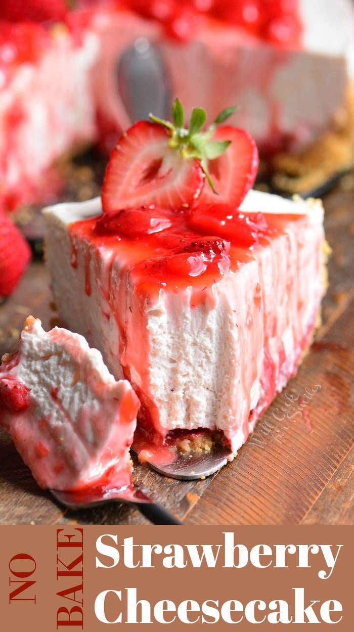 Strawberry No Bake Cheesecake slice on wood cutting board