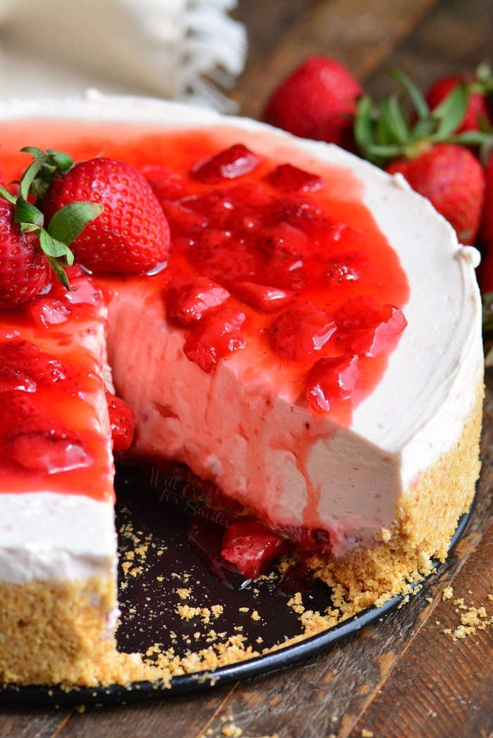 Homemade Strawberry No Bake Cheesecake with a piece missing. 