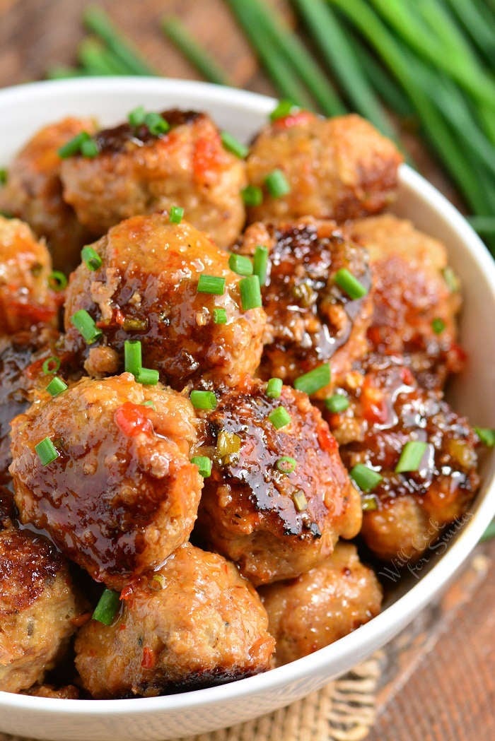 Sweet Chili Turkey Meatballs in a bowl in a wood cutting board 