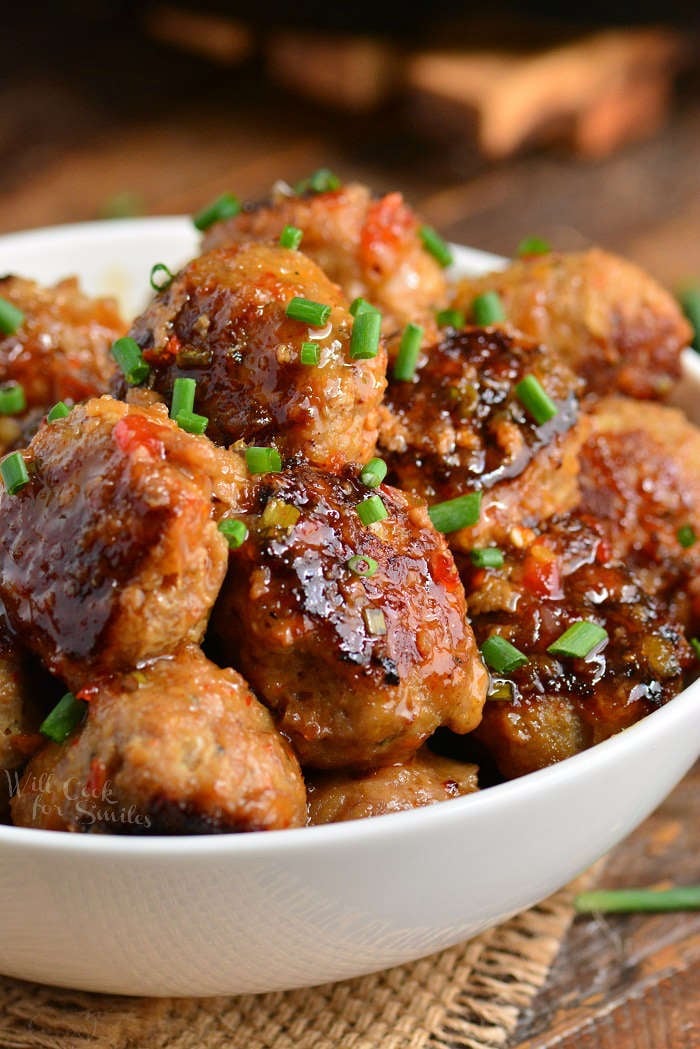 Sweet Chili Turkey Meatballs in a bowl in a wood cutting board 