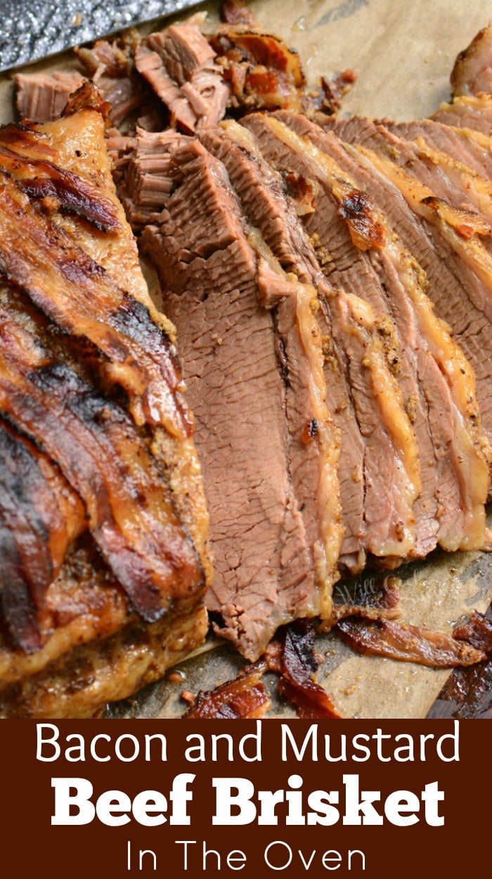 bacon and mustard beef brisket sliced on a wood cutting board 