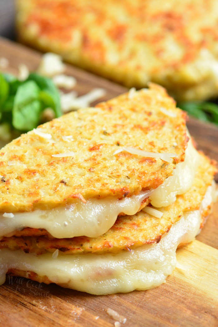 Cauliflower grilled cheese sliced on a cutting board 