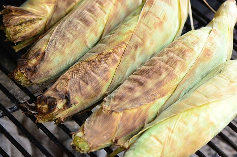 Corn on the cob in husks on the grill 