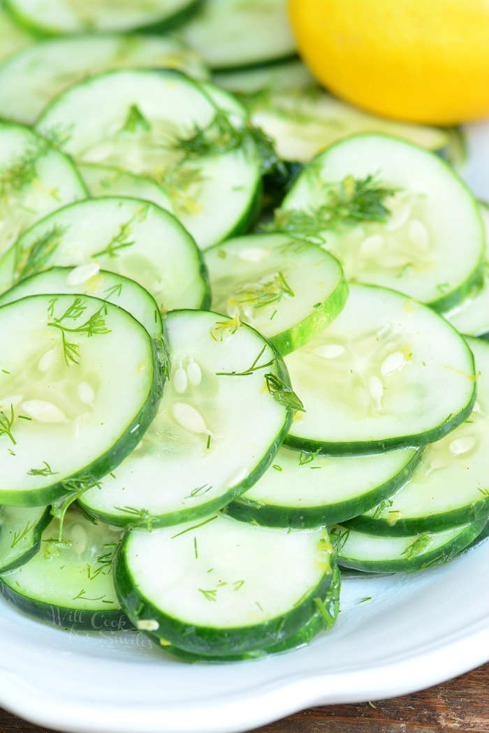 Cucumber Salad with dill and lemon on a serving platter 