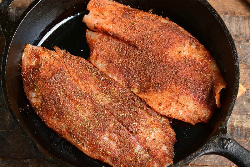 blackened fish in a cast iron skillet 