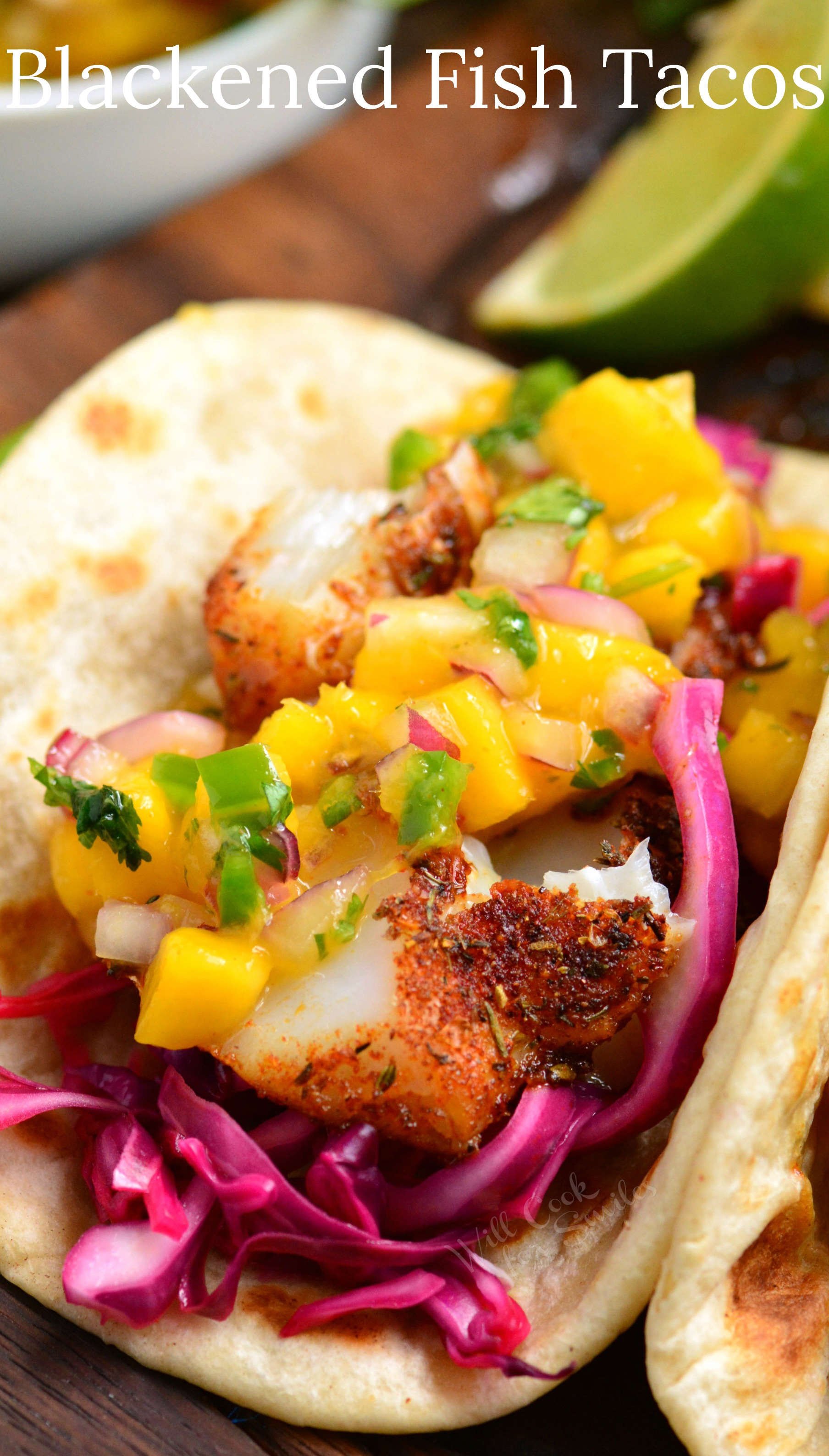 soft taco shell with blackened white fish and mango salsa on top.