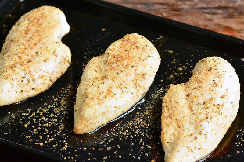 Cooked chicken baked on a baking sheet 