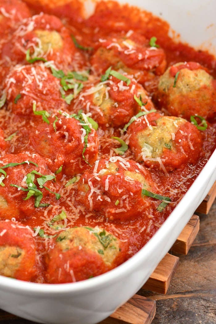 Chicken meatballs with sauce in a baking dish 