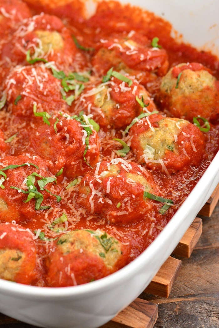 Chicken meatballs with sauce in a baking dish 